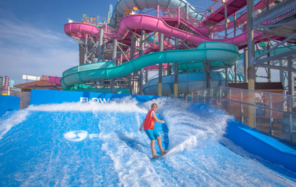 One person riding on a FlowRider at waterpark