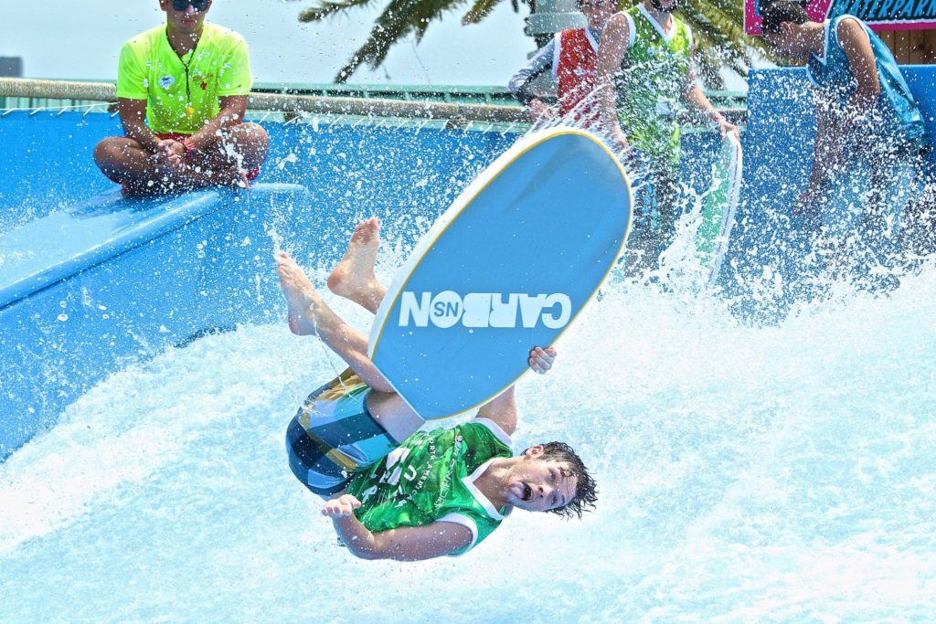 Bodyboarder does flip for the FLOW Tour